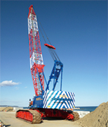 120tクローラによる護岸工事作業